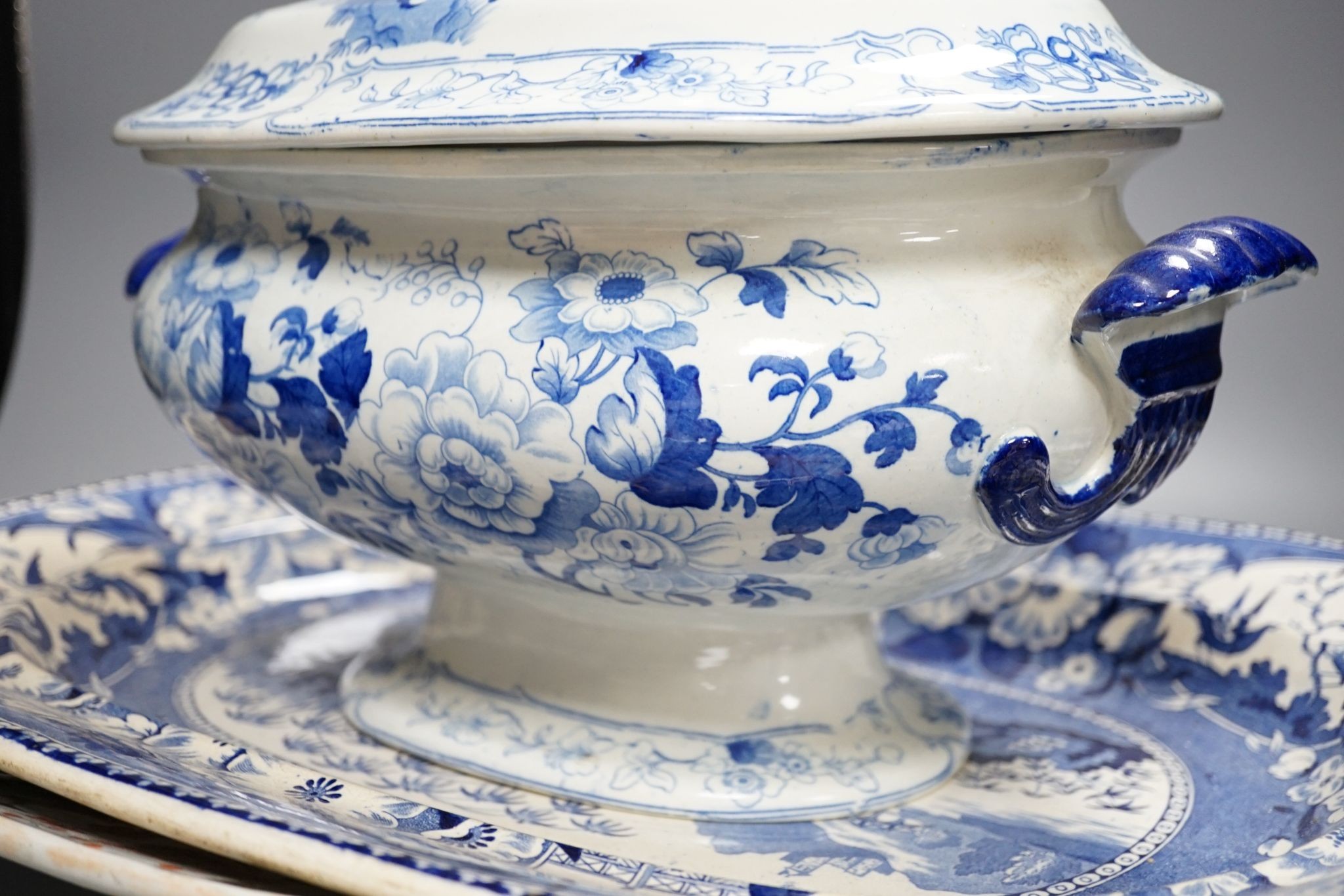 A Victorian Stone China soup tureen, 35cm wide, a Victorian blue-printed meat plate and a Masons Ironstone meat plate